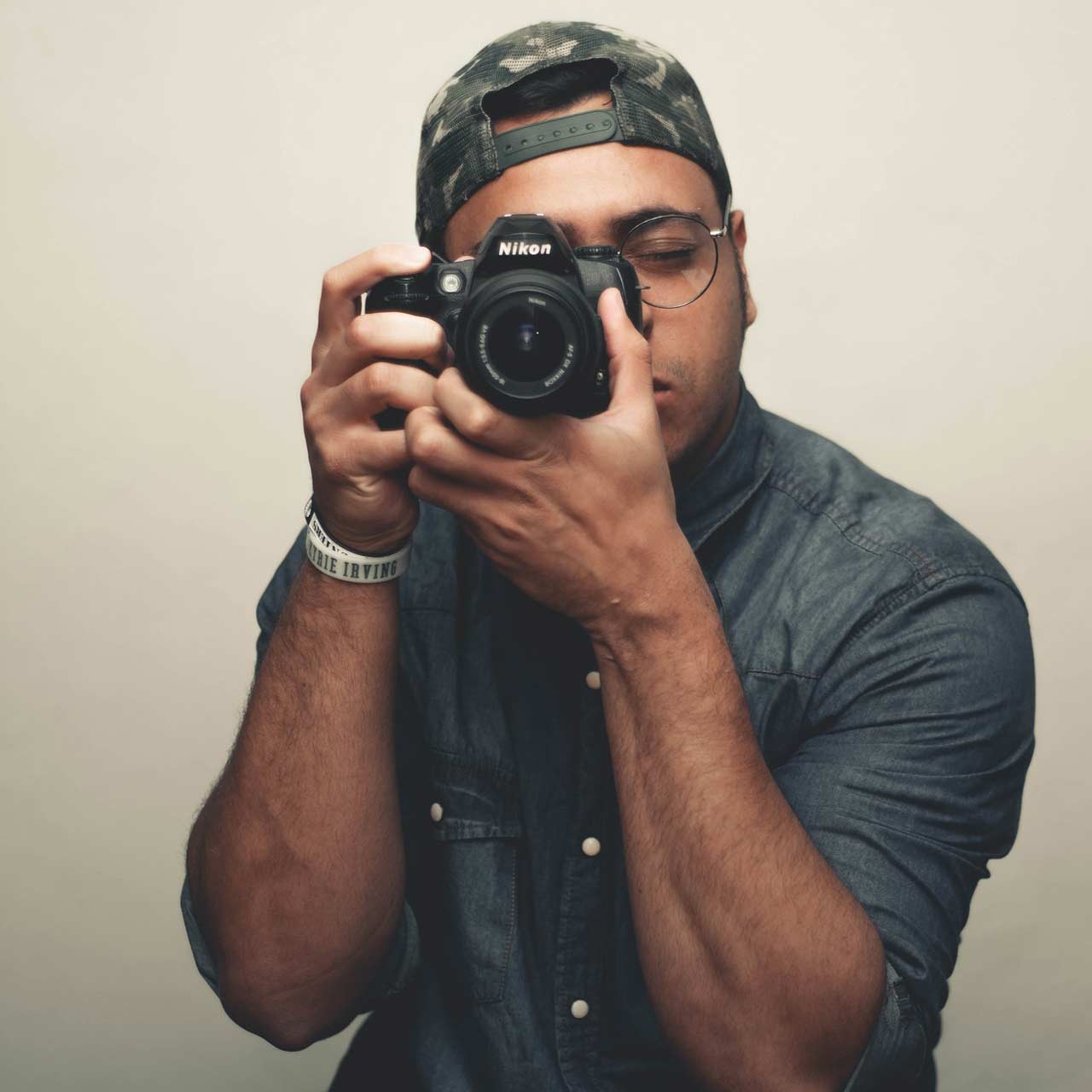 man-holding-camera-2941569